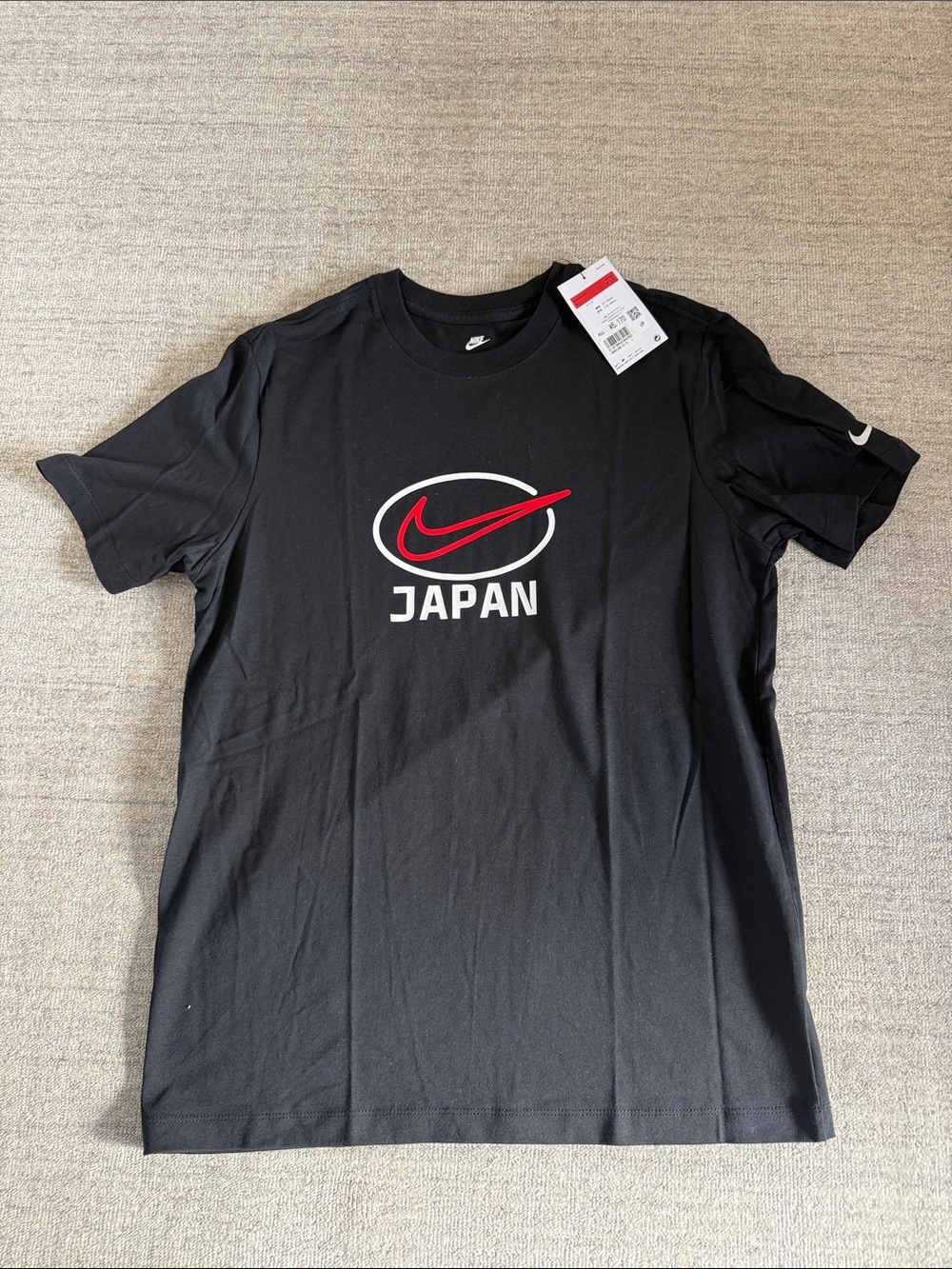 Nike Black T-Shirt with Red Swoosh and JAPAN Graphic